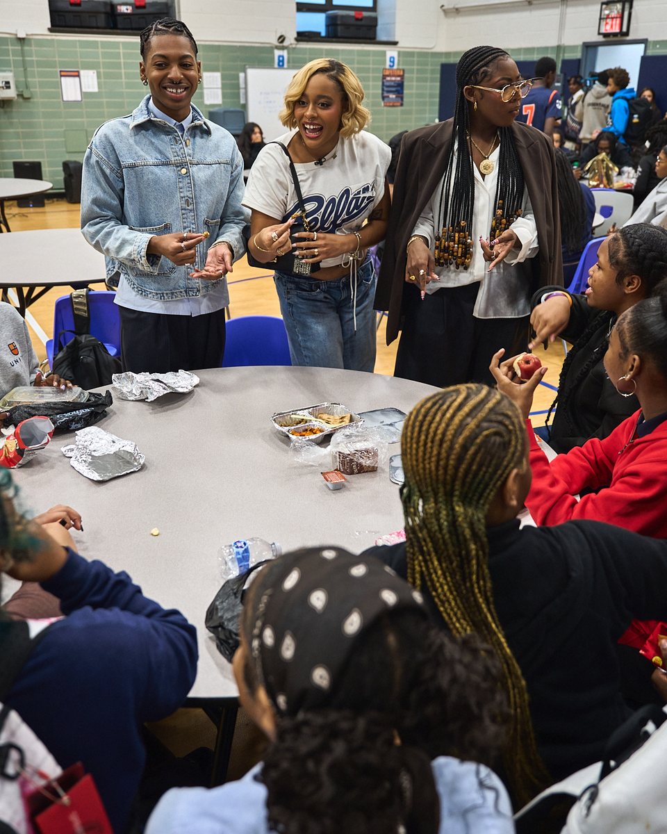 The cast of A Different World chatting with students at lunch at Unity Prep